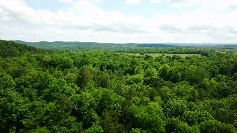 A stunning and dramatic aerial of lush mountains and valleys Stock Footage 337204510