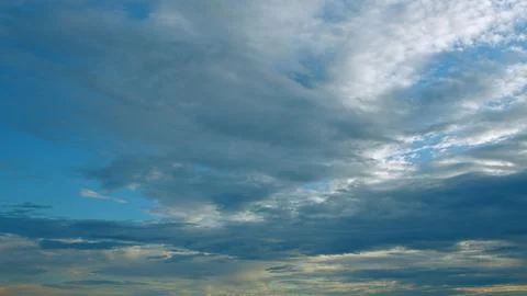 Stunning and Dramatic Cloud Patterns Beautifully Contrasted Against a Brilliant Stock Photos