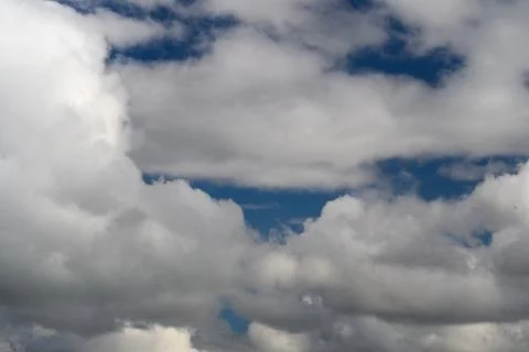 A Stunning and Dramatic Cloudscape Showcasing Beautiful Blue Sky Patches Through Stock Photos