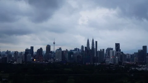 Stunning and dramatic time lapse of rolling clouds over Kuala Lumpur skyline Stock Footage 101063131