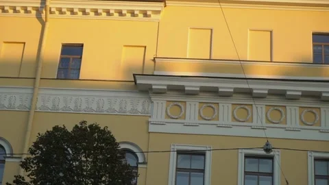 Stunning and Elegant Architectural Details Found on a Vibrant Yellow Buildings Stock Footage 291009986