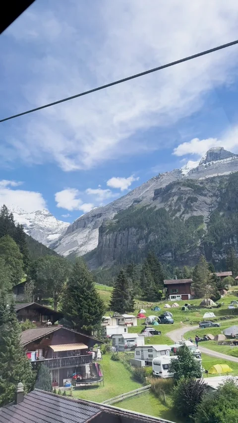 Stunning and Scenic Mountain View Featuring an Idyllic and Charming Swiss Stock Footage 307486897
