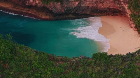 Stunning beach view with clear water and gentle waves in Bali Video stock 320304175
