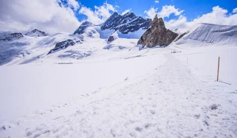 Stunning Beautiful Panoramic view of Snowcapped Bernese mountain alps Landscape Stock Photos