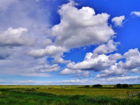 Stunning big sky over fields, Burnham Overy Staithe, North Norfolk Stock Photos