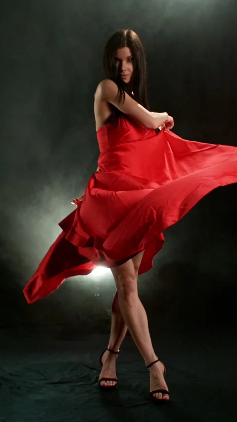 Stunning Black-Haired Woman in Ruby Red Dress and High Heels. Stock Footage 306848915