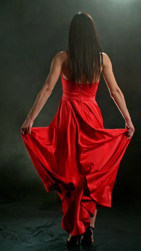 Stunning Black-Haired Woman in Ruby Red Dress and High Heels. Stock Footage 306850339