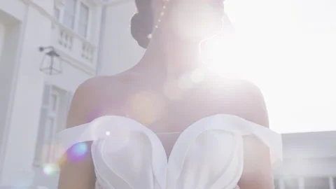 Stunning bride shines in elegant wedding photoshoot at sunset location Stock Footage 321624528
