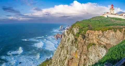 Stunning Cabo de Roca Lighthouse Overlooking Atlantic Ocean Cliffs. Stock Photos