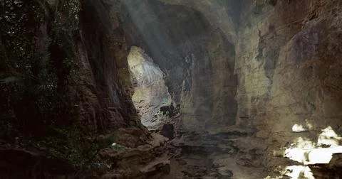 Stunning cave interior with sunlight beams illuminating rocky walls Stock Illustration