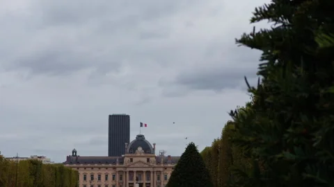 The stunning city skyline features a flag beautifully waving above and an Stock Footage 318497686