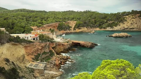 Stunning Cliffside View Overlooking a Secluded Turquoise Bay Stock-Footage 300903217