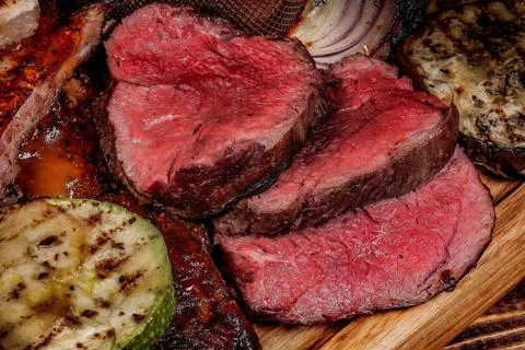 Stunning Close Range View Of Succulent Slices Of Grilled Steak Paired With Ap Stock Photos