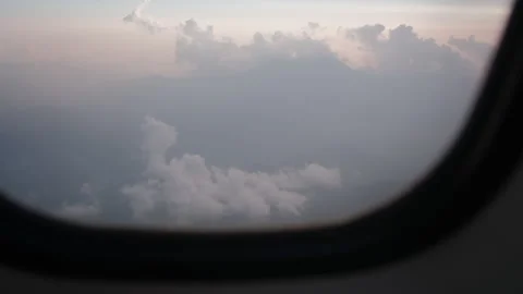 Stunning cloud formations and Himalayan landscapes, view from the plane Stock Footage 303379416