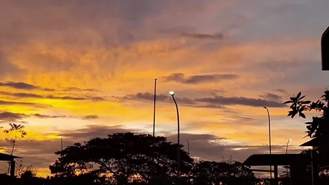Stunning Cloud Glow. Fiery Sunset Clouds. Glowing Evening Sky Stock Footage 311385879