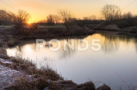 Stunning countryside landscape vibrant winter sunrise Stock Photos