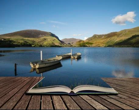 Stunning dramatic stormy sky formations over breathtaking mountain lake lands Stock Photos