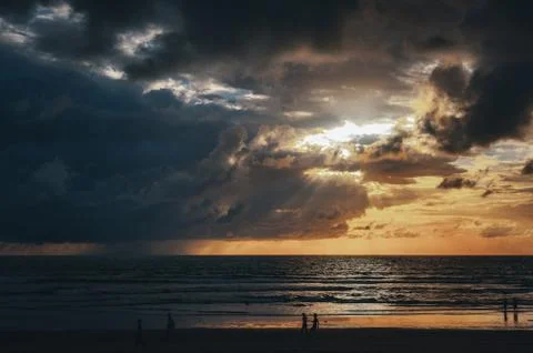 Stunning dramatic sunset over the ocean. Stock Photos