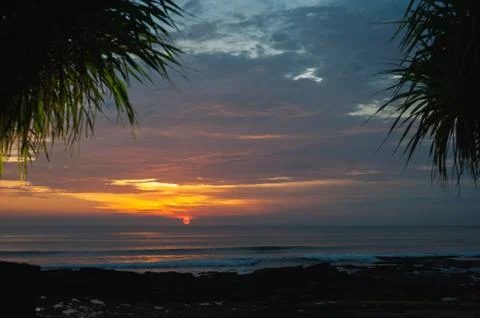 Stunning dramatic sunset over the ocean. Stock Photos