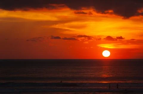 Stunning dramatic sunset over the ocean. Stock Photos