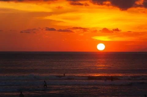 Stunning dramatic sunset over the ocean. Stock Photos