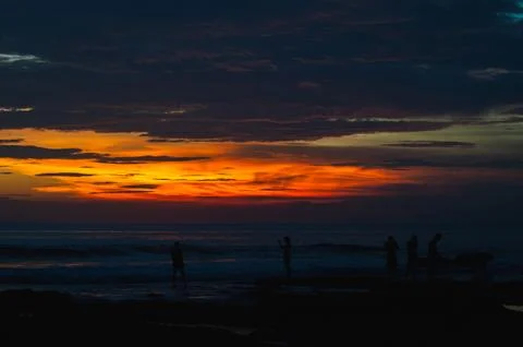 Stunning dramatic sunset over the ocean. Stock Photos