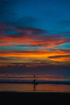 Stunning dramatic sunset over the ocean. Stock Photos
