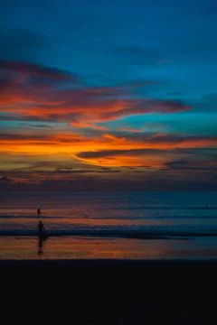 Stunning dramatic sunset over the ocean. Stock Photos