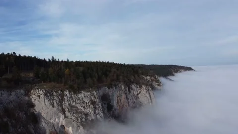 Stunning Drone Footage of Cloud-Crowned Mountains - 4K Stock Video Stock Footage 239019722