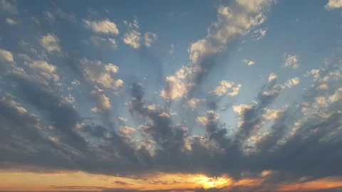 Stunning drone footage of a dramatic sunset sky, with vibrant colors, radiant 스톡 동영상 312804372