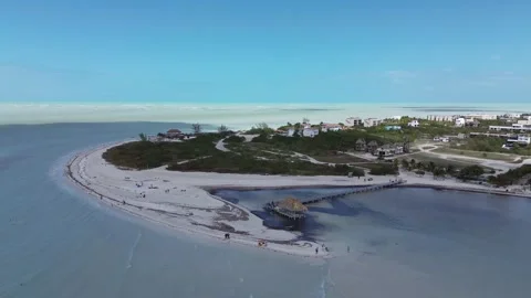 Stunning drone rotation around a rustic overwater structure in Holbox, Mexico Stock Footage 331519766