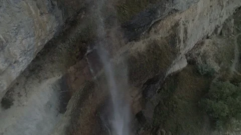 Stunning Drone View of a Cliffside Mountain Waterfall Stock Footage 318833280