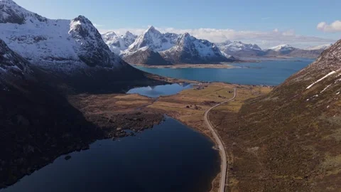 Stunning drone views of mountains and lakes in Norway on a sunny day Stock Footage 334774572