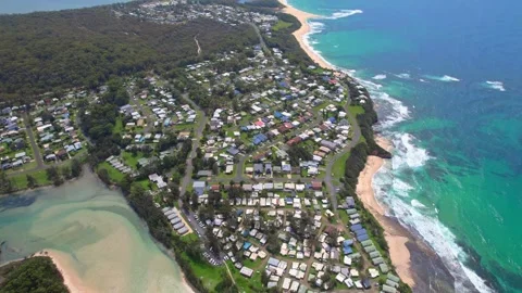 A stunning drones-eye view of Berrara, a picturesque Australian coastal village Stock-Footage 306124893