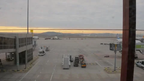 A stunning dusk view of planes parked at the Sabiha Gokcen Airport 動画素材 325977181
