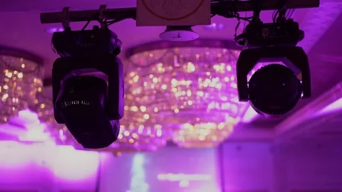 Stunning event with dynamic purple and pink lighting for vibrant celebration Stock Footage 290848951