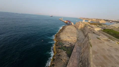 Stunning flight over the pier next to the cozy bay of Valletta Stock Footage 248782579