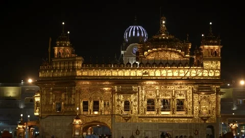 Stunning Full View of Golden Temple Surrounded by Sacred Water Stock Footage 331341061