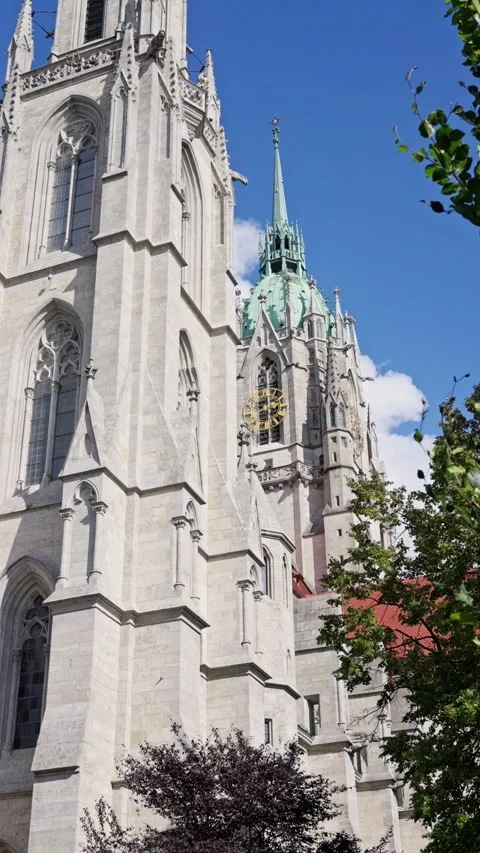 The stunning Gothic cathedrals architecture shines in daylight, showcasing Stock Footage 318897130
