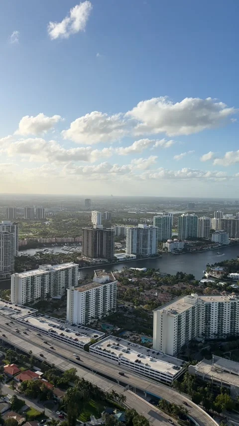 Stunning highrise aerial view capturing urban skylines amidst dynamic cloud. Stock Footage 315524705
