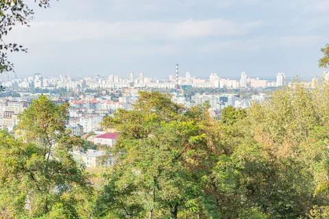 A stunning image showcasing a panoramic view of a city from atop a hill, wi.. Stock Photos