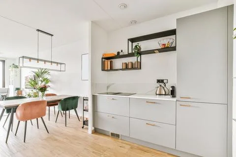 Stunning kitchen with gray kitchen unit Stock Photos