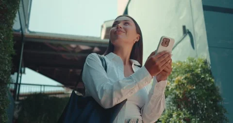 Stunning lady taking time to observe and absorb urban environment greater Stock Footage 312508031