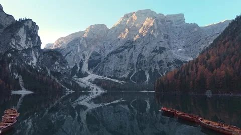Stunning lake reflections in the mountains at dawn Stock Footage 320304313