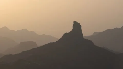 Stunning Large Geological Form, Mountains in Distance Sunset Warm Light. Ro.. Stock Footage 314416910
