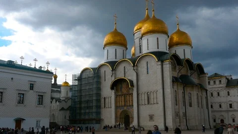 Stunning light on Dormition Cathedral inside Moscow Kremlin with a cloudy sky Stock Footage 99257641