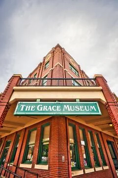 A stunning low angle view of The Grace Museum in Abilene, Texas, with a sky-high Stock Photos