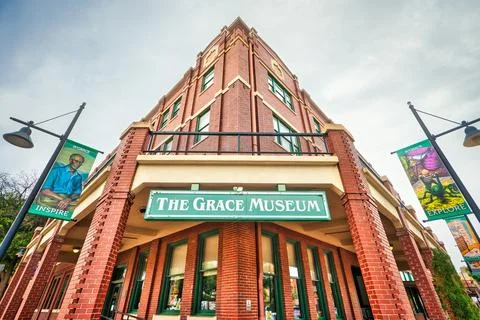 A stunning low angle view of The Grace Museum in Abilene, Texas, with a sky-high Stock Photos