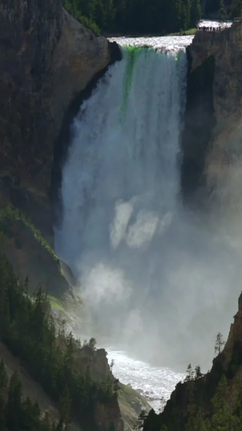 The stunning Lower Falls of the Yellowstone River in the Grand Canyon of Stock Footage 315614926
