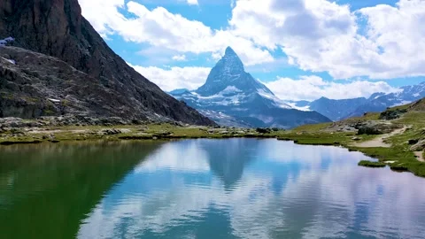 Stunning Matterhorn mountain view with reflection on the waters. Stock Footage 323167720